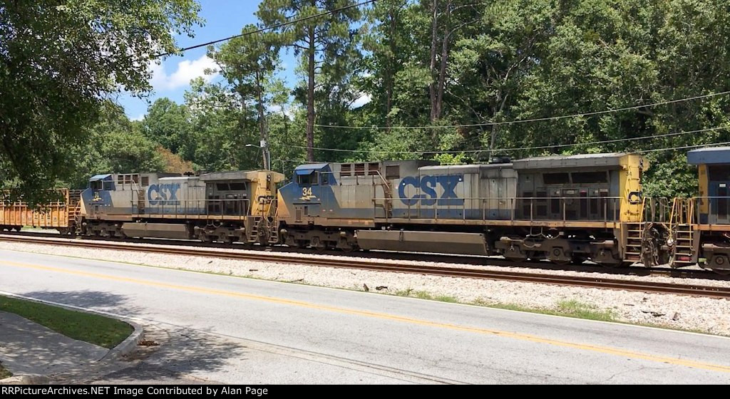 CSX 34 and 74 run second and third SB